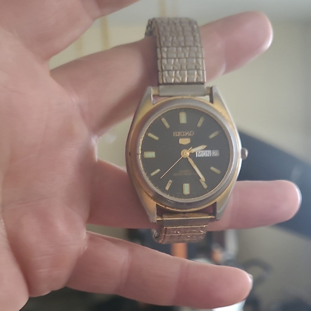Seiko Gold-Tone Watch with Black Dial